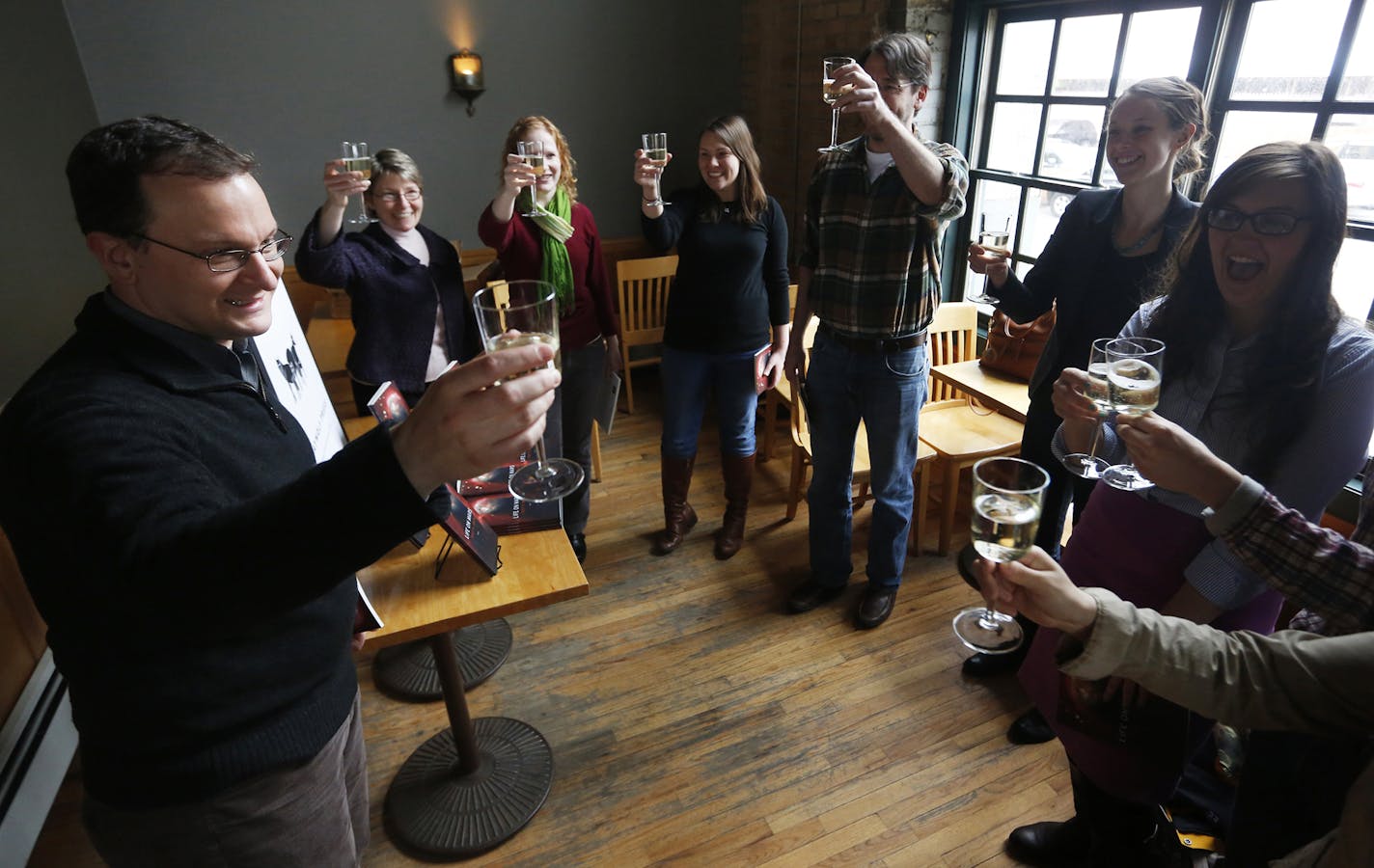 At Bev's wine bar, senior poetry editor Jeff Shotts toasted cohorts with some Prosseco on the just announced Pulitzer Prize for poetry book "Life on Mars" by Tracy K. Smith, which he edited. ] rtsong-taatarii@startribune.com, Jeff Shotts(cq) ORG XMIT: MIN2013040812402760