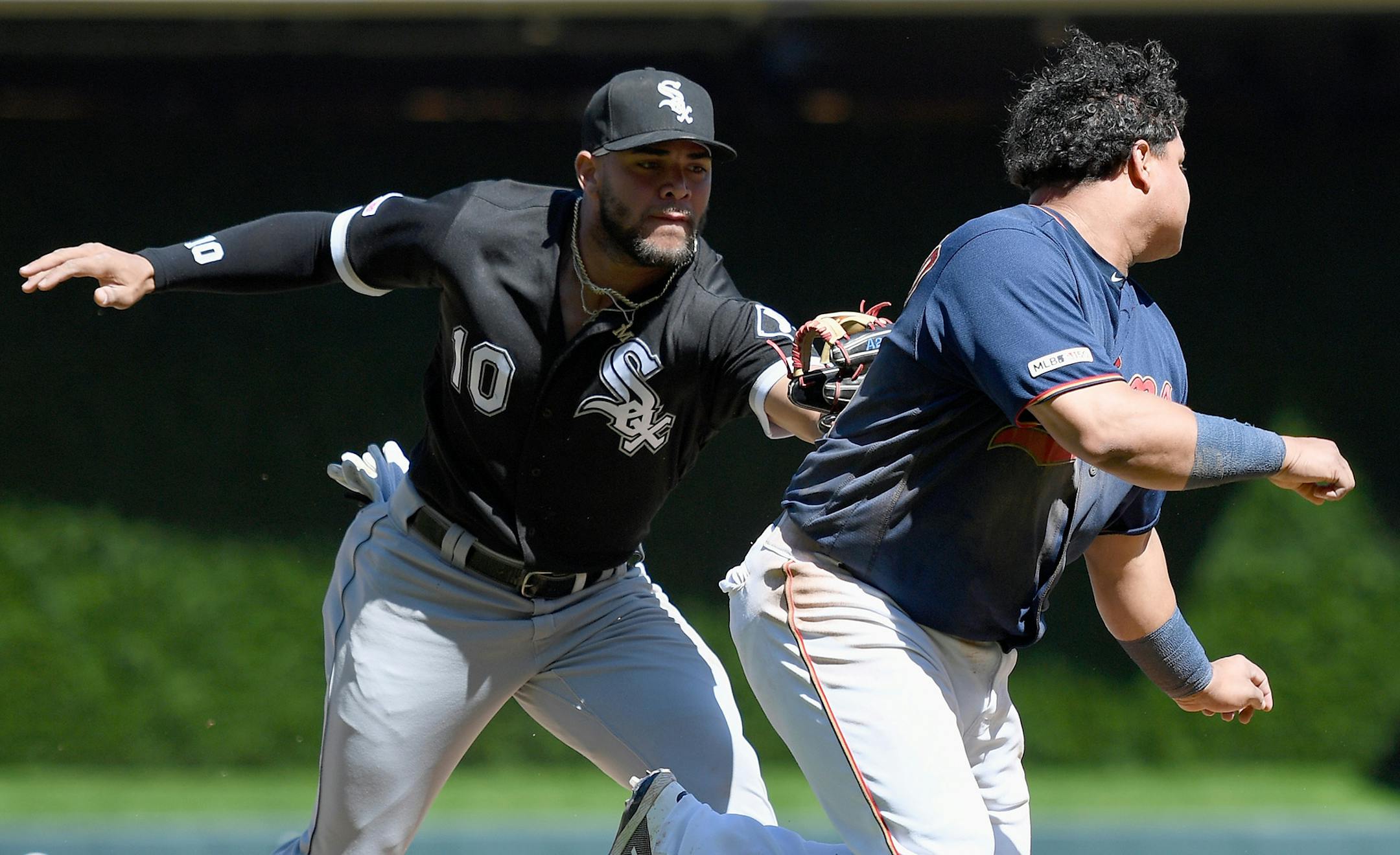 Yoan Moncada (10) of the Chicago White Sox tags out Willians Astudillo (64) of the Minnesota Twins after a rundown between third base and home plate during the seventh inning on Sunday, May 26, 2019 at Target Field in Minneapolis, Minn. The Twins defeated the White Sox 7-0. (Hannah Foslien/Getty Images/TNS) **FOR USE WITH THIS STORY ONLY** ORG XMIT: 1323820