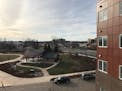 The view from a third-floor balcony facing a city park at Oxford Village, a new 51-unit affordable housing complex along Blake Road N. in Hopkins.