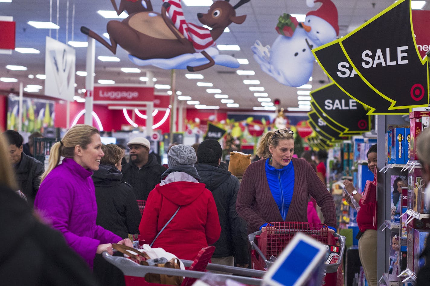 At the Ridgedale Target in Minnetonka, sales were brisk when the Target store opened for Black Friday at 6 o'clock .]Richard Tsong-Taatarii/rtsong-taatarii@startribune.com