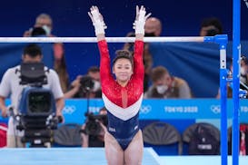 Olympic gold medalist Suni Lee has been training a new skill on the uneven bars. If she successfully performs the skill at a major international event