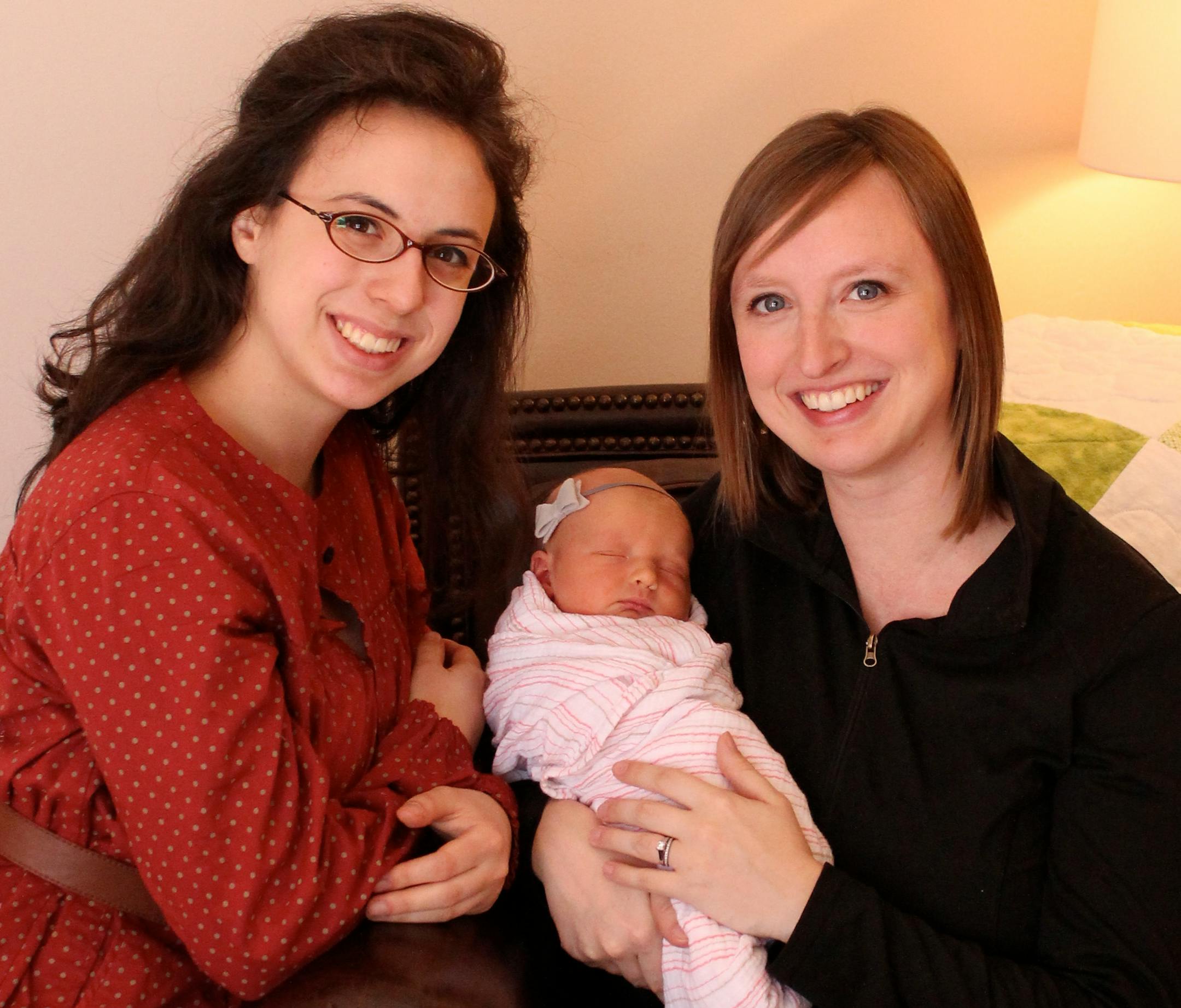 From left, aunt Melisa Sturman, baby Maggie Reinders and mom Angela Reinders.