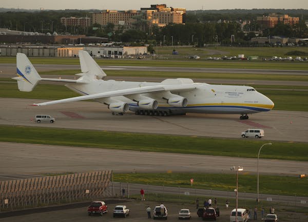 The Antonov 225, the world's largest plane in service, was parked on the tarmac at MSP Monday evening.
