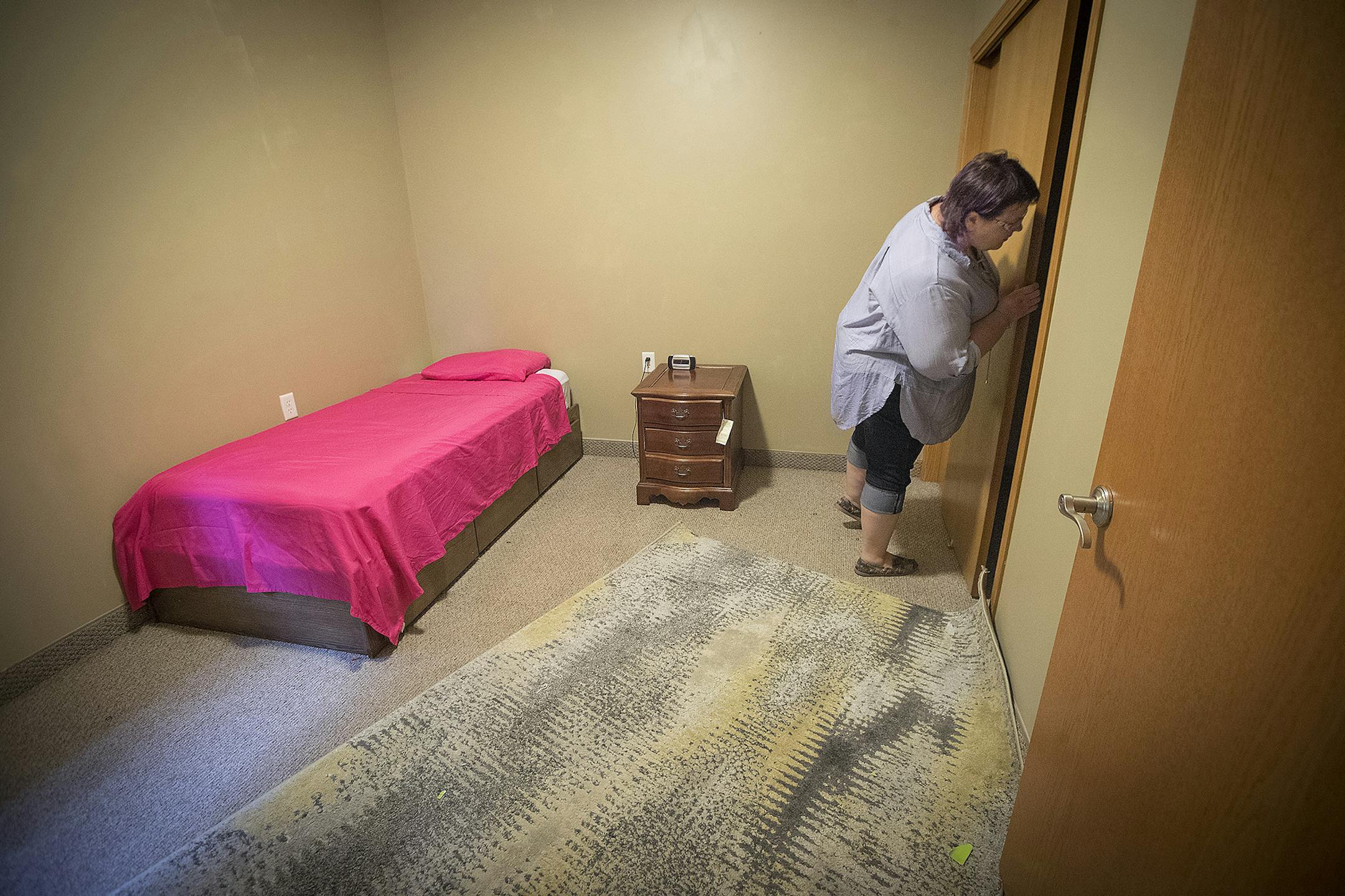 Heidi Kopischke, west metro regional navigator at the Link's Passageways Shelter and Housing Program cleaned up an apartment to get ready for a sex trafficking victim in Prior Lake.
