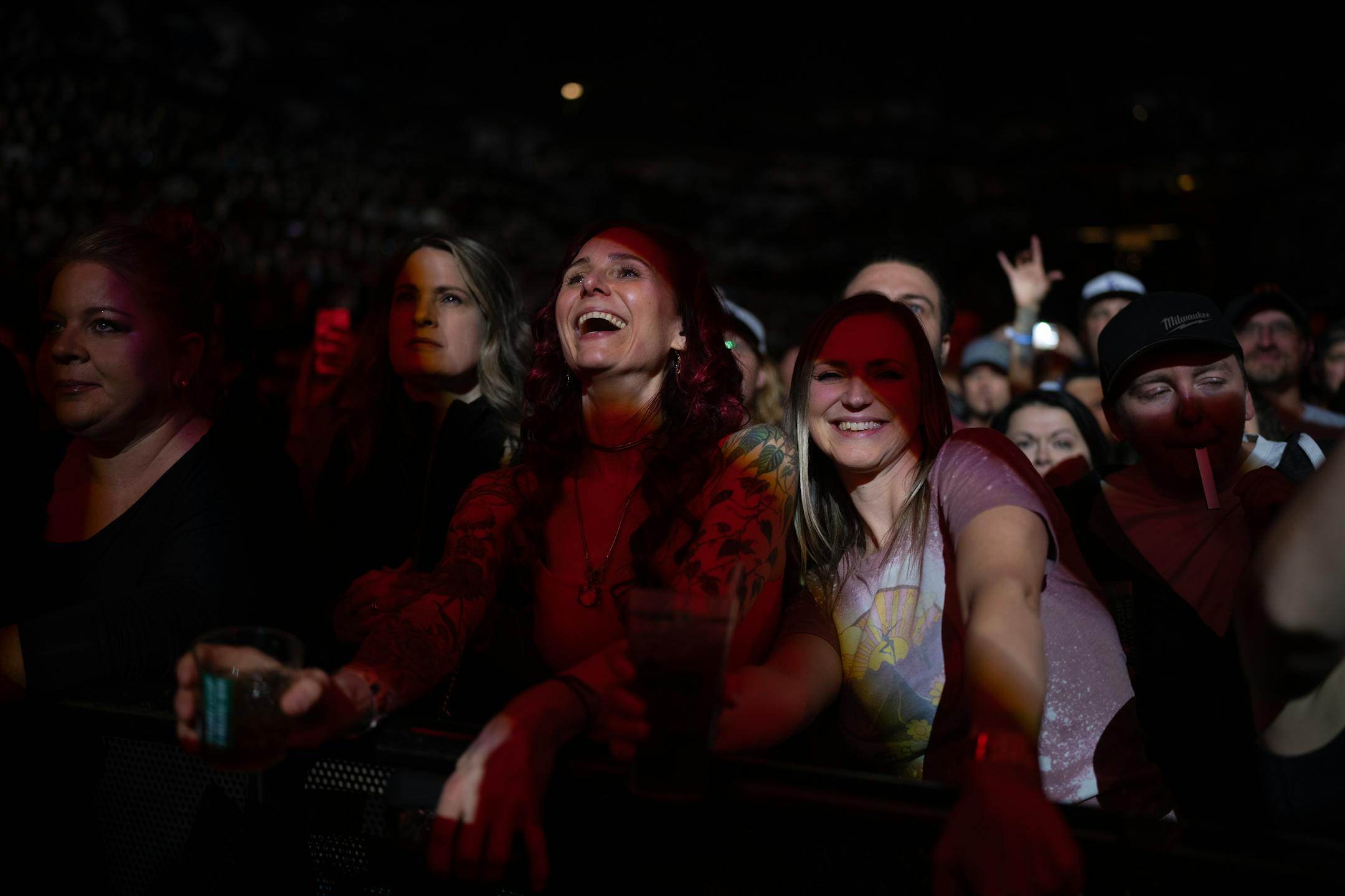 Front row fans grooved to Dave Matthews performing with his band early in their show.