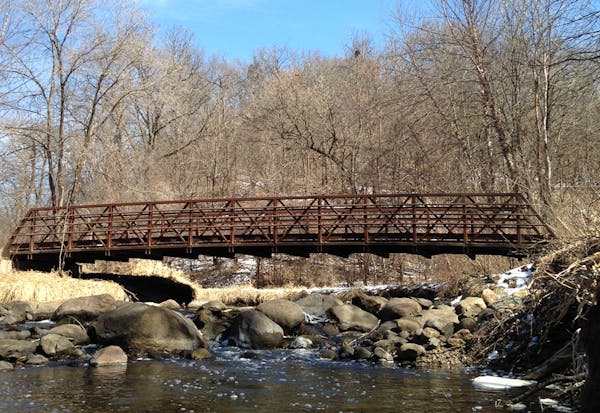 A common sight:&#x2009;a footbridge along Nine Mile Creek.
