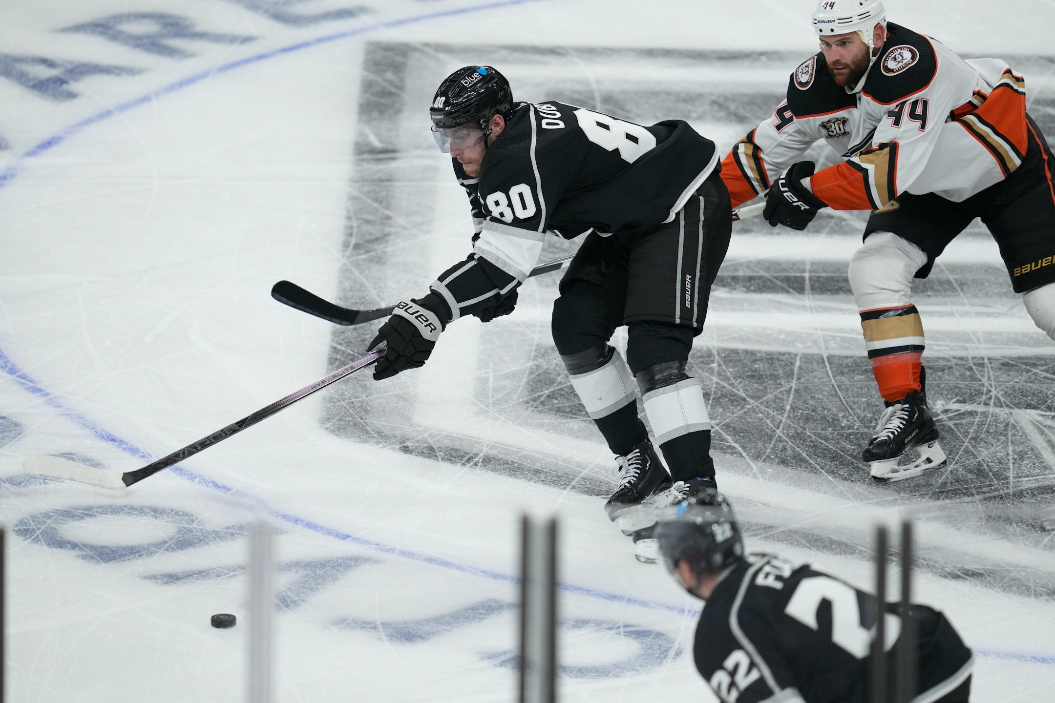 Los Angeles Kings left wing Pierre-Luc Dubois (80) controls the puck against Anaheim Ducks' Zack Kassian (44) during the first period of an NHL preseason hockey game Tuesday, Oct. 3, 2023, in Los Angeles. (AP Photo/Ashley Landis)