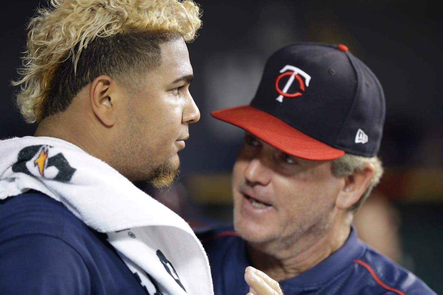 Minnesota Twins starting pitcher Adalberto Mejia talks with pitching coach Neil Allen after being pulled during the sixth inning of a baseball game against the Detroit Tigers, Thursday, Sept. 21, 2017, in Detroit. (AP Photo/Carlos Osorio)