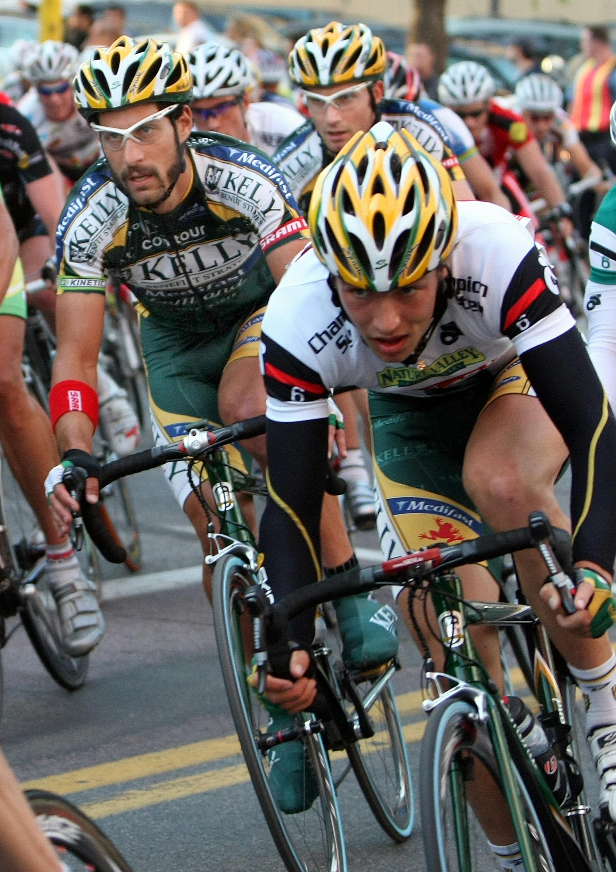 Charles Aaron, manager of the KBS/Medifast team doing what a mangers do before and during the race- they'll meet at the team office. The Great River Energy Bicycle Festival in downtown Minneapolis Friday. A KBS teamembers during the race.