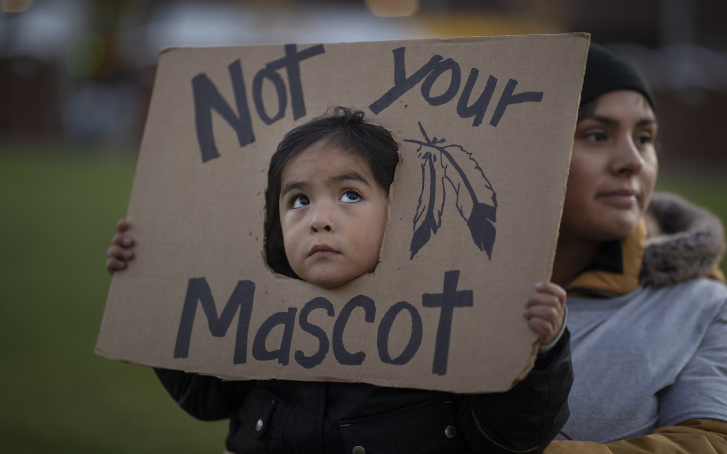 Fox Iron Eaglefeather 3, with his mother Melody Iron Eaglefeather protested with a group of Native American the use of Redskins as a mascot at The Commons in Minneapolis.] Jerry Holt &#x2022; Jerry.holt@startribune.com Native Americans protest the Washington Redskins mascot at U.S. Bank Stadium Thursday Oct. 24, 2019. Minneapolis, MN. Jerry Holt