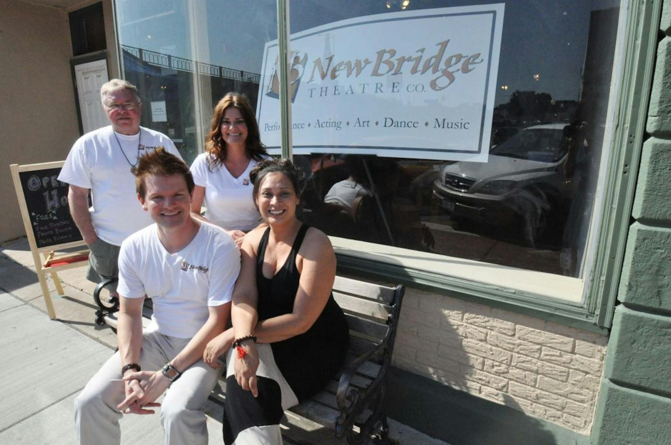 Photo by Liz Rolfsmeier (Left to right) Teaching artist Jim Tanner, executive producer Jonathan Goodman, artistic director Elizabeth Tanner, and business manager Nena Peterson sat outside the NewBridge Theatre Company and arts education facility in Hastings. Classes at the new space begin July 30.