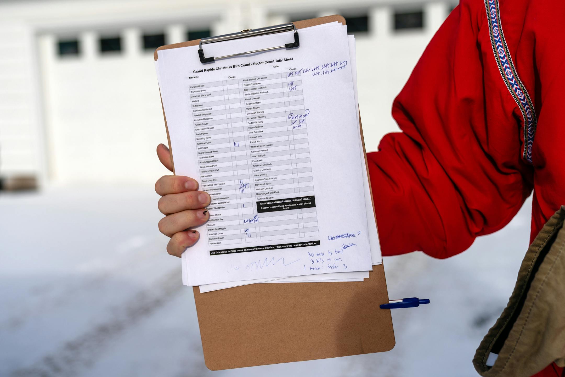 Malachy Koons holds the final tally sheet of birds spotted on Dec. 14, 2025 during the annual Christmas Bird Count in Itasca County.