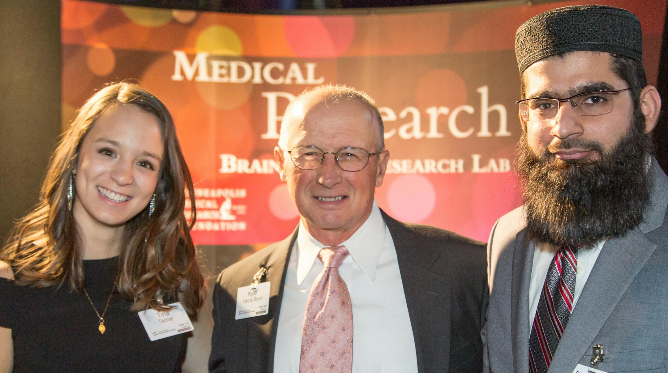 Tina Techar, Kyle Vance-Bryan, Abdullahi Bin-Zahid attend the HCMC Light Up the Night Gala at US Bank Stadium. [ Special to Star Tribune, photo by Matt Blewett, Matte B Photography, matt@mattebphoto.com, December 2, 2016, Hennepin County Medical Center Light up the Night Gala, US Bank Stadium, Minneapolis, Minnesota, SAXO 1002449430, 010117FACES http://www.und.com/sports/w-rowing/mtt/tina_techar_842960.html