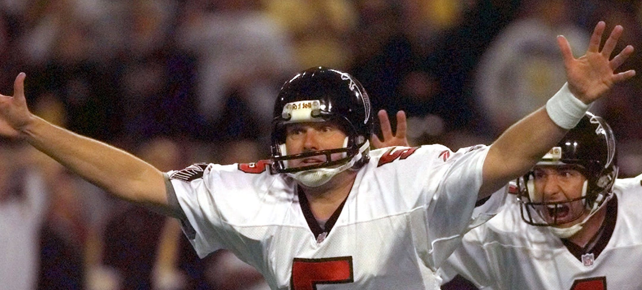 FILE - In this Jan. 17, 1999, file photo, Atlanta Falcons kicker Morten Andersen (5) and holder Dan Stryzinski (4) celebrate Andersen's 39-yard field goal to give Atlanta a 30-27 overtime win over the Minnesota Vikings in the NFC Championship in Minneapolis. Andersen, who began his NFL career with the New Orleans Saints in 1982, enters the Pro Football Hall of Fame as the leading scorer in NFL history with 2,544 points. He played in a record 382 games during his 25-year career. (AP Photo/Ed Rein