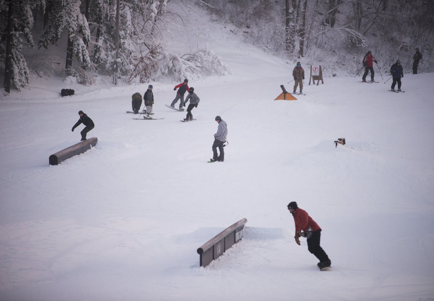 Skiers and snowboarders pack the terrain park at Afton Alps during opening day Friday afternoon. ] AARON LAVINSKY &#x2022; aaron.lavinsky@startribune.com Afton Alps, the largest ski resort in the Twin Cities area, will officially open for the 2014-15 ski and snowboard season on Friday, Nov. 14, 2014 in Hastings.