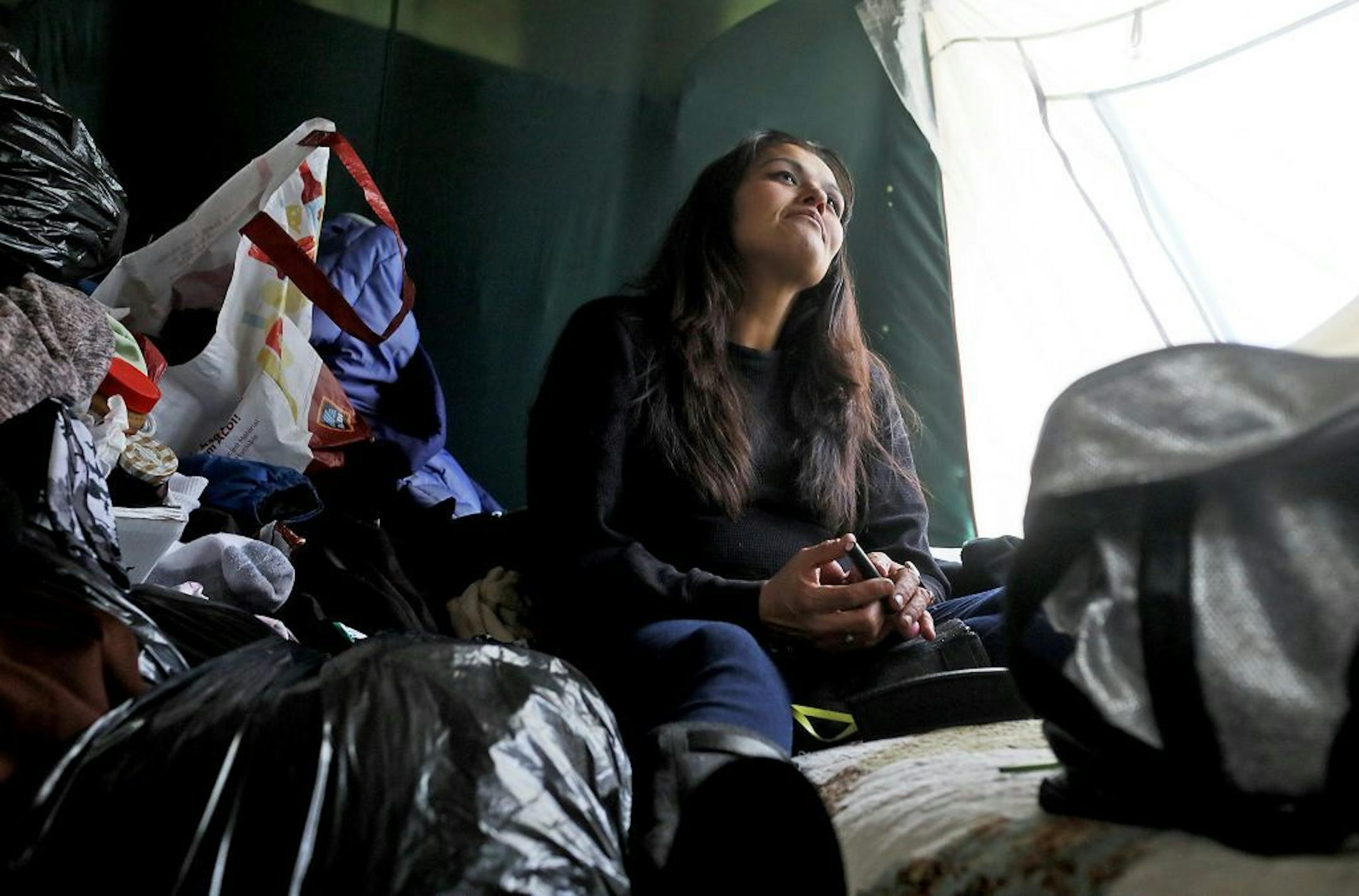 During a good day, Katherine "Kat" Yanez invited journalists into her tent where she talked about possibly rehabbing and leaving behind a life of drugs Thursday, Oct. 25, 2018, in Minneapolis, MN. Yanez' sister Celesta Yanez died of a drug overdose a week ago. Their mother, Noreen Yanez, is now concerned that Kat, who now lives at the navigation center, may suffer the same fate unless rules change at the south Minneapolis center.