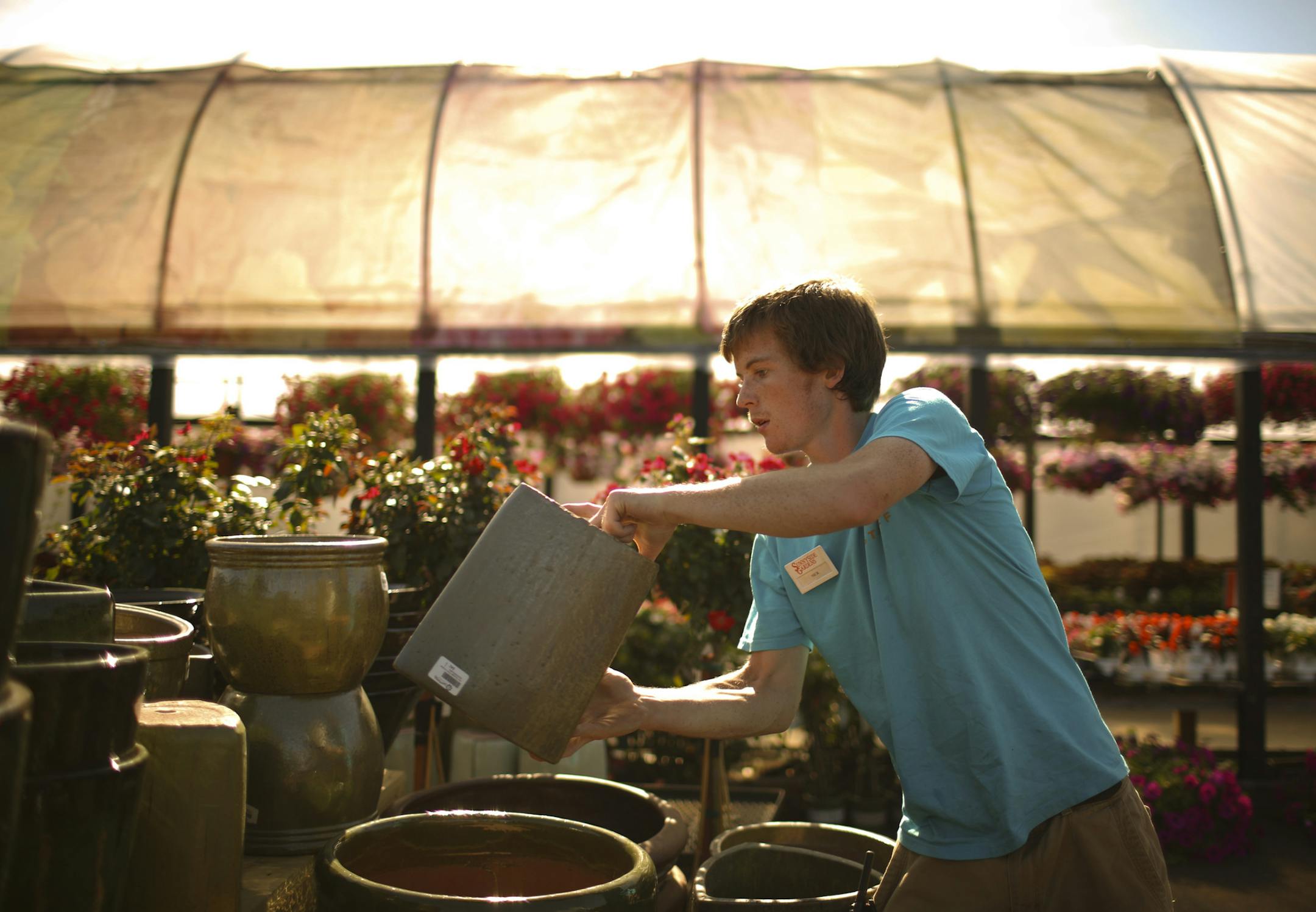 The job market for teens in the Twin Cities is better than the national average. Nick Bither, 17, a senior at Southewest High School in Minneapolis, refreshed the inventory of glazed pots at Sunnyside Garden Center in Minneapolis Tuesday afternoon, June 12, 2012. "I've had a summer job since I was 13. I've never had a problem finding anything to do," he said. ] JEFF WHEELER ‚Ä¢ jeff.wheeler@startribune.com