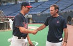 Joe Mauer and Paul Molitor - both Cretin-Derham Hall graduates - exchanged pleasantries in 2001 after Mauer was drafted by the Twins. Now Molitor is o
