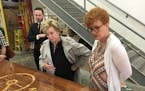 Cindy Siewert, right, met with the Small Business Administration's Linda McMahon to discuss her firm, Wood From the Hood.