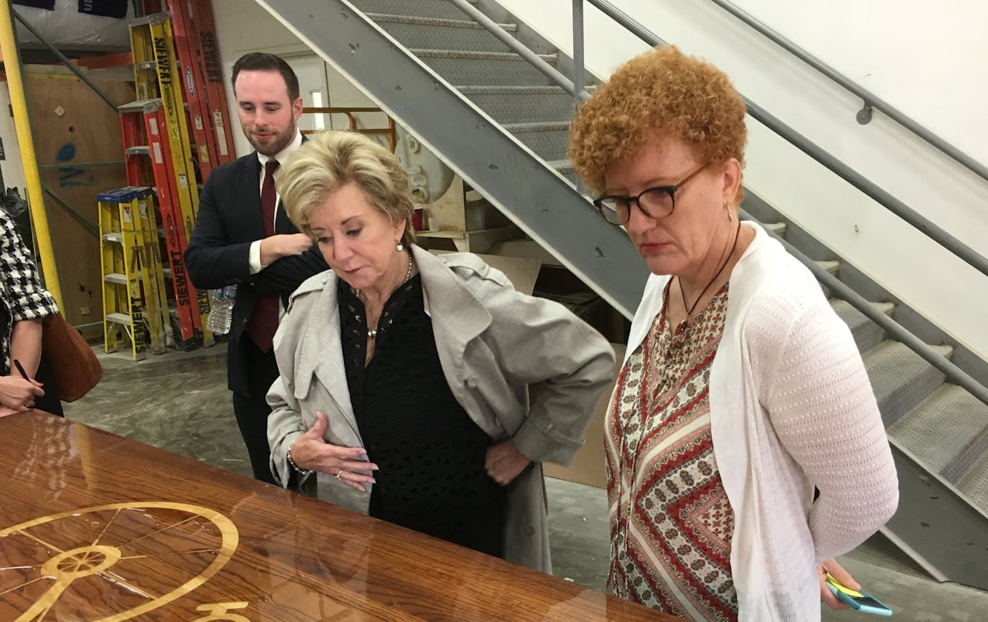 Cindy Siewert, right, met with the Small Business Administration's Linda McMahon to discuss her firm, Wood From the Hood.