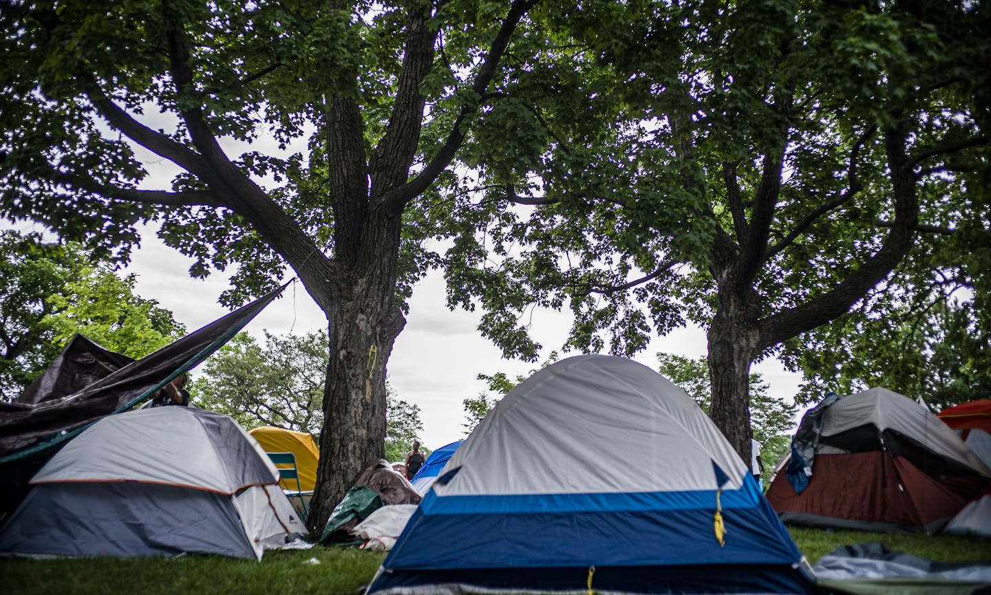 Minneapolis park leaders on Wednesday said they would allow homeless residents to set up camp in local parks, a response to encampments in Powderhorn Park that have grown to more than 200 tents in recent days.] RICHARD TSONG-TAATARII ¥ richard.tsong-taatarii@startribune.com