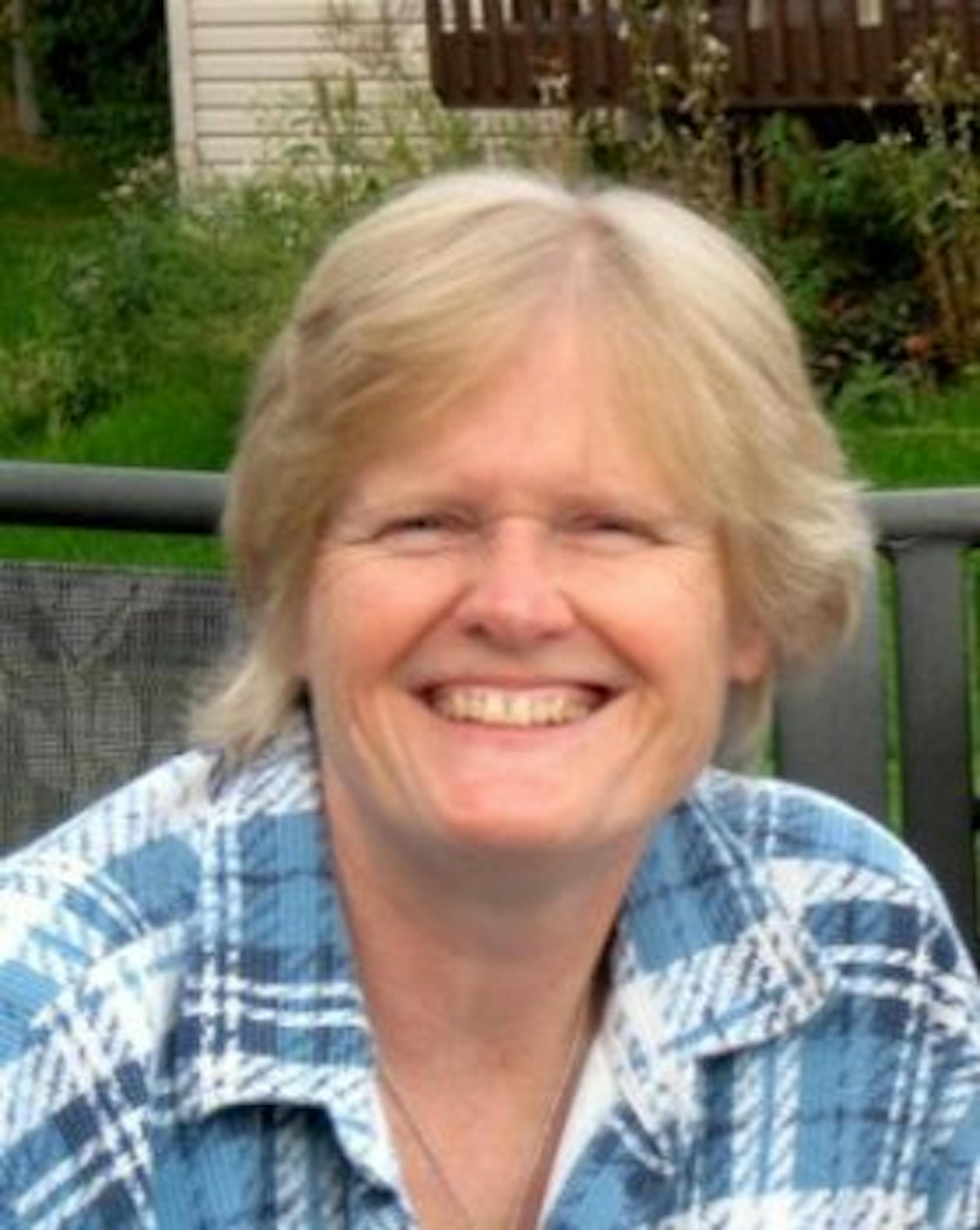 Ann Blake was fatally struck by a vehicle as she stood on a sidewalk in Maple Grove