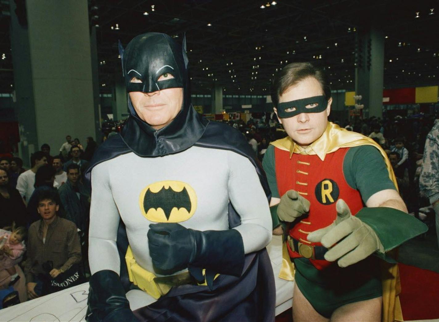 FILE - In this Sunday, Jan. 27, 1989 file photo, actors Adam West, left, and Burt Ward, dressed as their characters Batman and Robin, pose for a photo at the "World of Wheels" custom car show in Chicago. On Saturday, June 10, 2017, West�s family said the actor, who portrayed Batman in a 1960s TV series, has died at age 88.