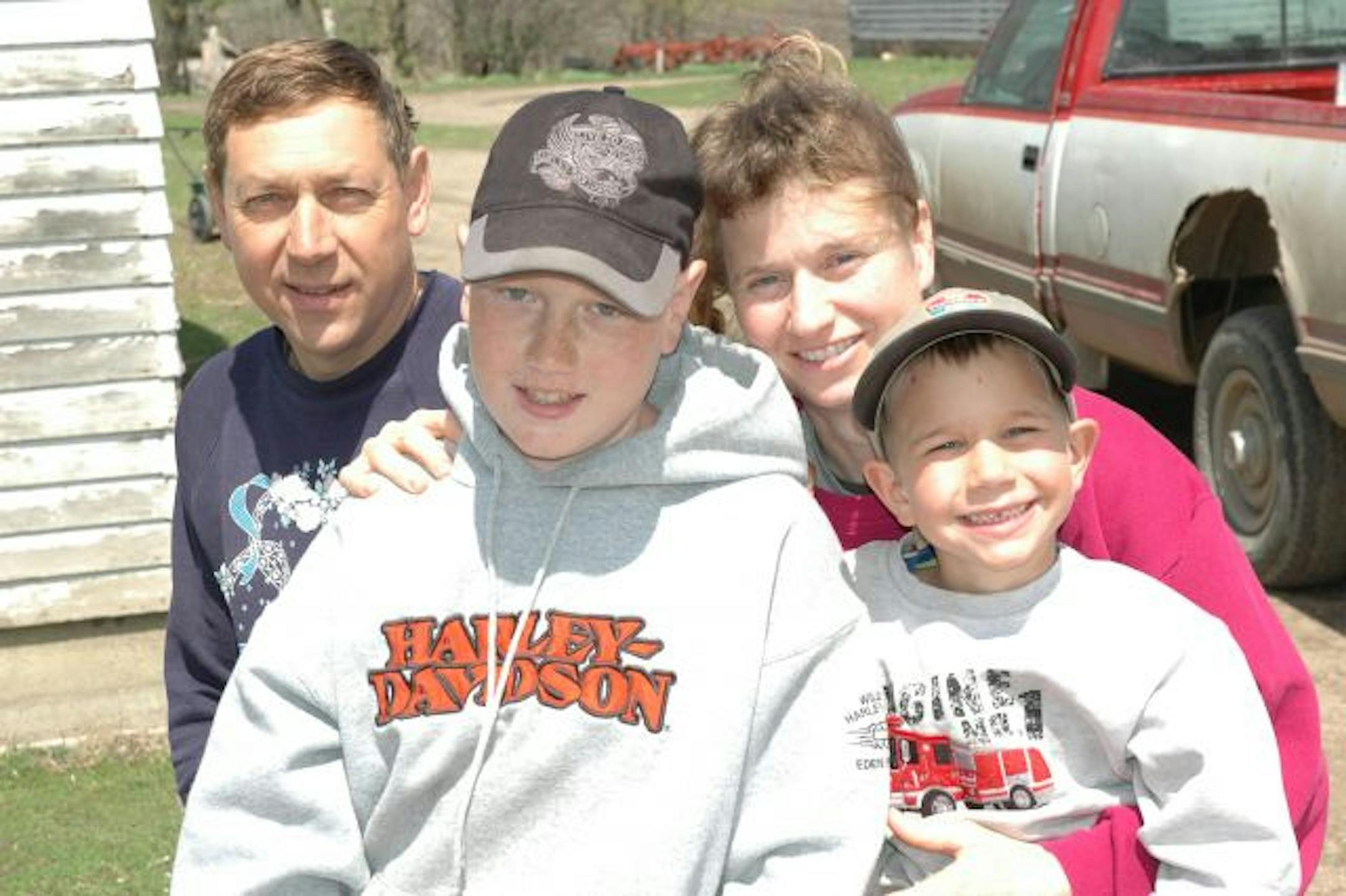 The Hauser family, with Daniel Hauser, front, belongs to an American Indian religious organization called Nemenhah.