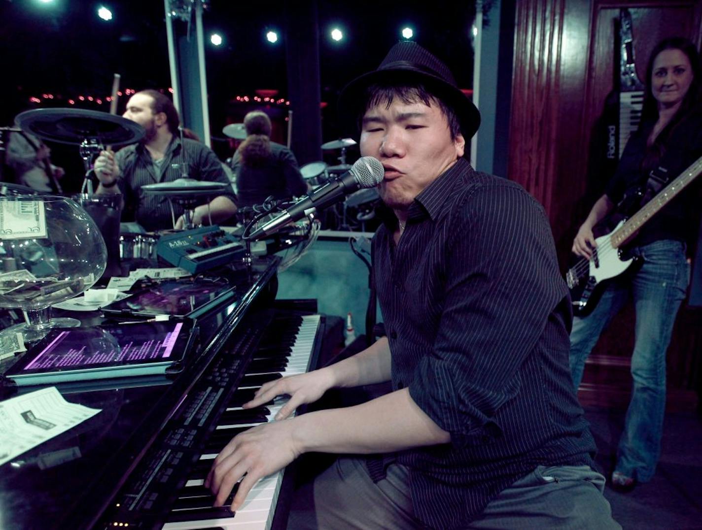 Jon Li tickled the ivories at Howl at the Moon, the recently opened "rock 'n' roll piano bar."