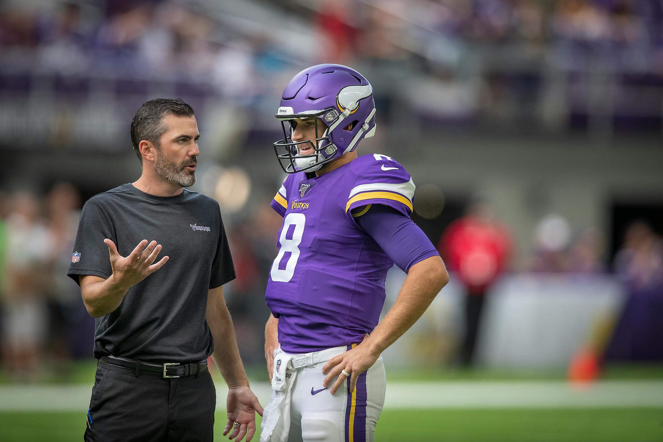 Vikings offensive coordinator Kevin Stefanski spoke with quarterback Kirk Cousins during Week 3 of the preseason vs. the Arizona Cardinals