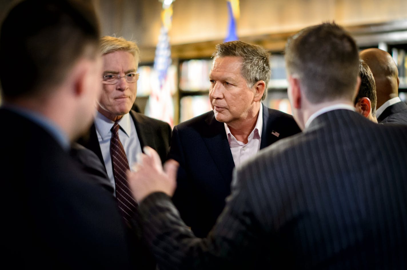 Former Minnesota Congressman Tim Penney walked John Kasich from the press conference a the Minneapolis Club to the fund raiser lunch across the hall. ] GLEN STUBBE * gstubbe@startribune.com Tuesday, March 22, 2016 Republican presidential candidate John Kasich, in town to raise money at the Minneapolis Club, held a press availability at noon.