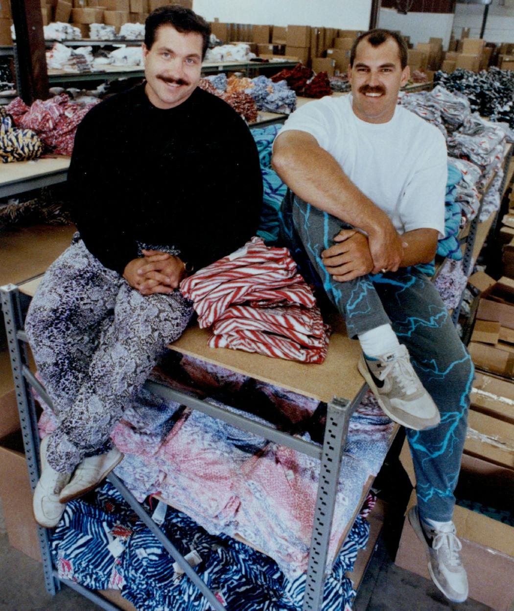 Bob Truax and Dan Stock sat atop a rack of Zubaz in a Roseville warehouse in 1991.
