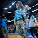 Minnesota Lynx guard Lindsay Whalen (13) was escorted to the locker room after injuring her left hand in the third quarter against the Atlanta Dream o
