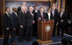 Senate Majority Leader Mitch McConnell (R-Ky.) speaks alongside fellow Republicans after the passage of their tax bill, on Capitol Hill in Washington,