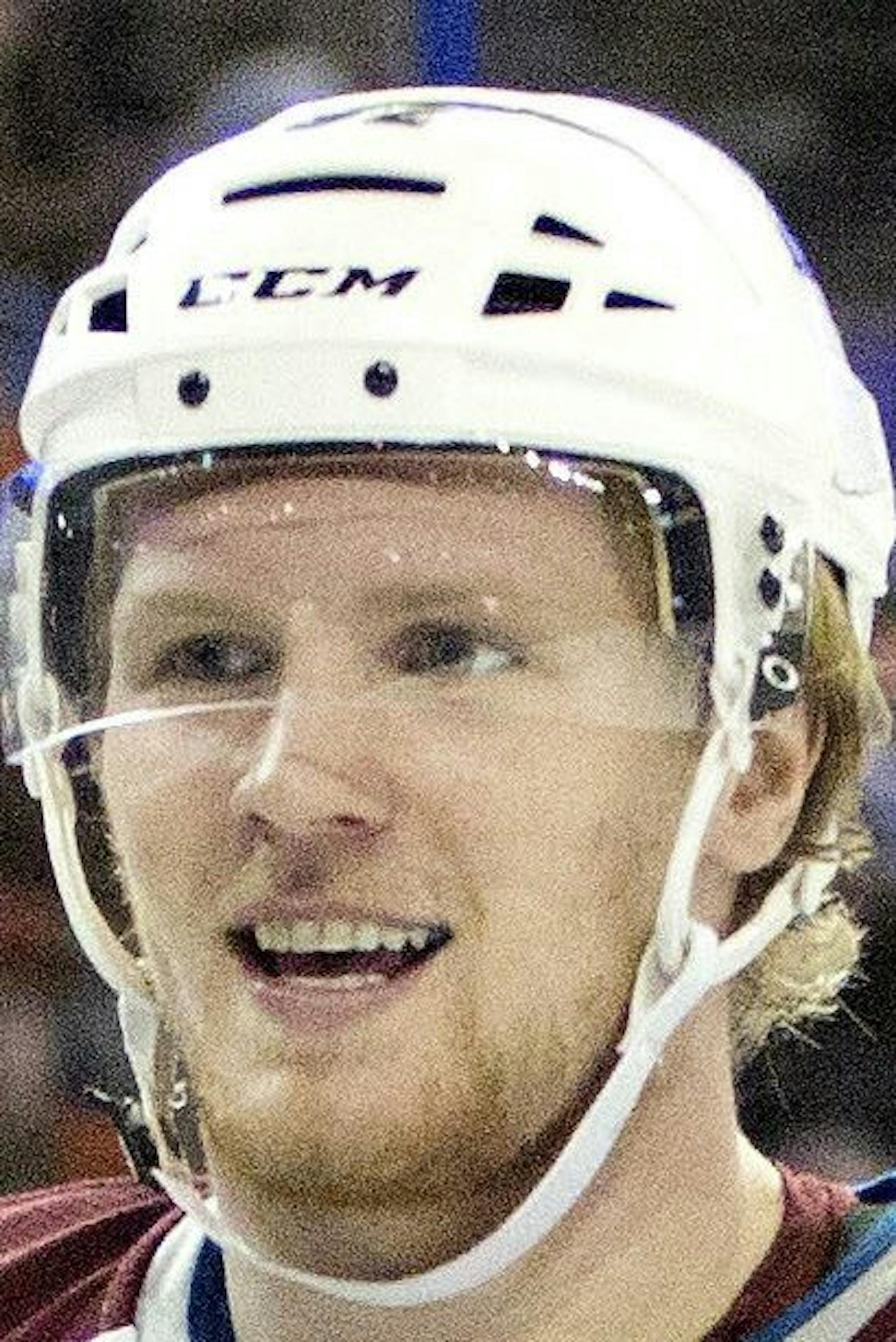 Colorado Avalanche's Paul Stastny (26) and Gabriel Landeskog (92) celebrate a goal against the Edmonton Oilers during first period NHL hockey action in Edmonton, Alberta, on Tuesday April 8, 2014. (AP Photo/The Canadian Press, Jason Franson)