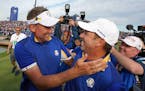 FILE - In this Sept. 30, 2018, file photo, Europe's Sergio Garcia, right, celebrates with Ian Poulter after Europe won the Ryder Cup on the final day 
