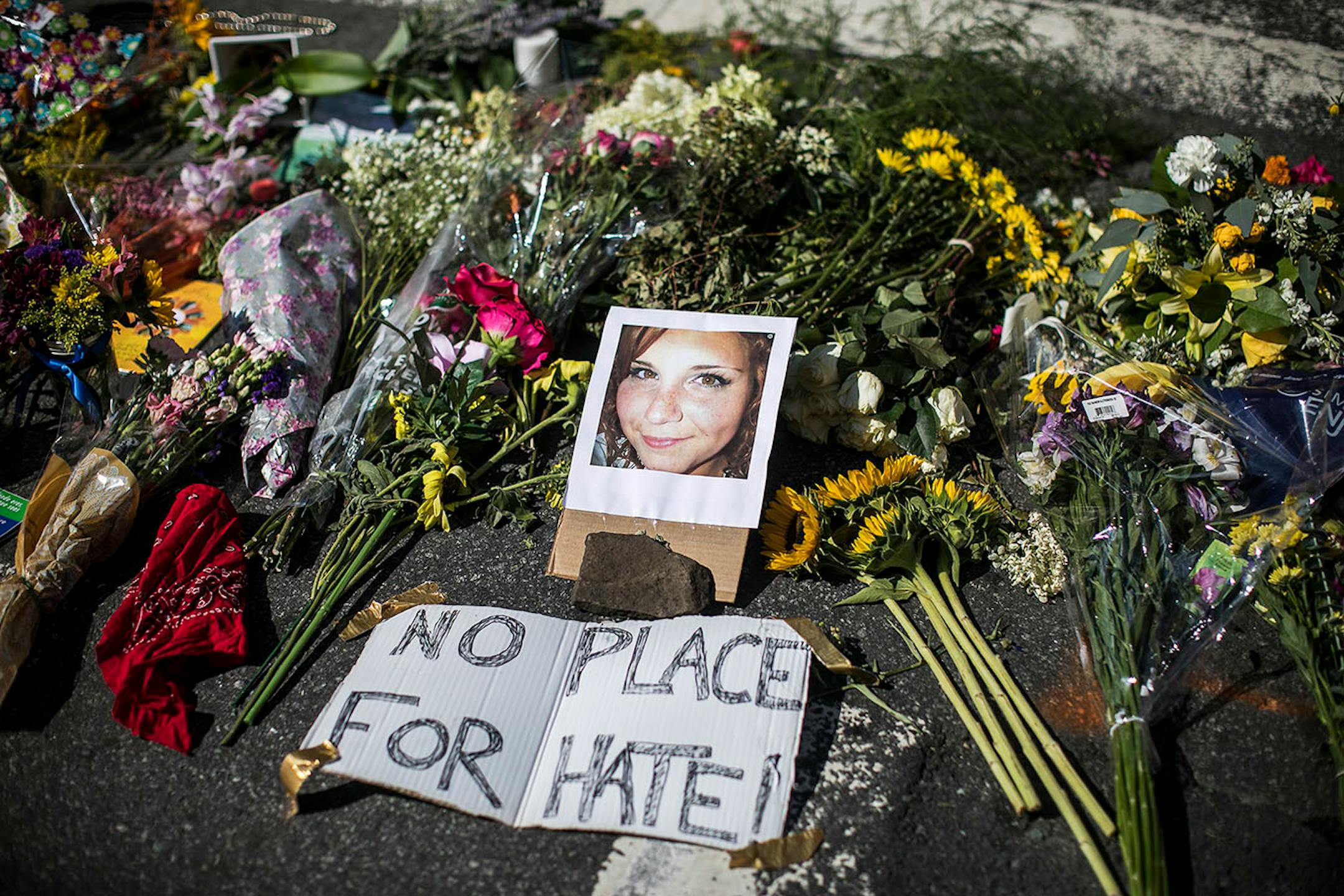 FILE ó A memorial for Heather Heyer at the scene where she was killed when a man drove into a crowd during a protest against a rally of white nationalists in Charlottesville, Va., Aug. 13, 2017. The Daily Stormer, a neo-Nazi website, was kicked off of both GoDaddy.com and Google after mocking Heyer.