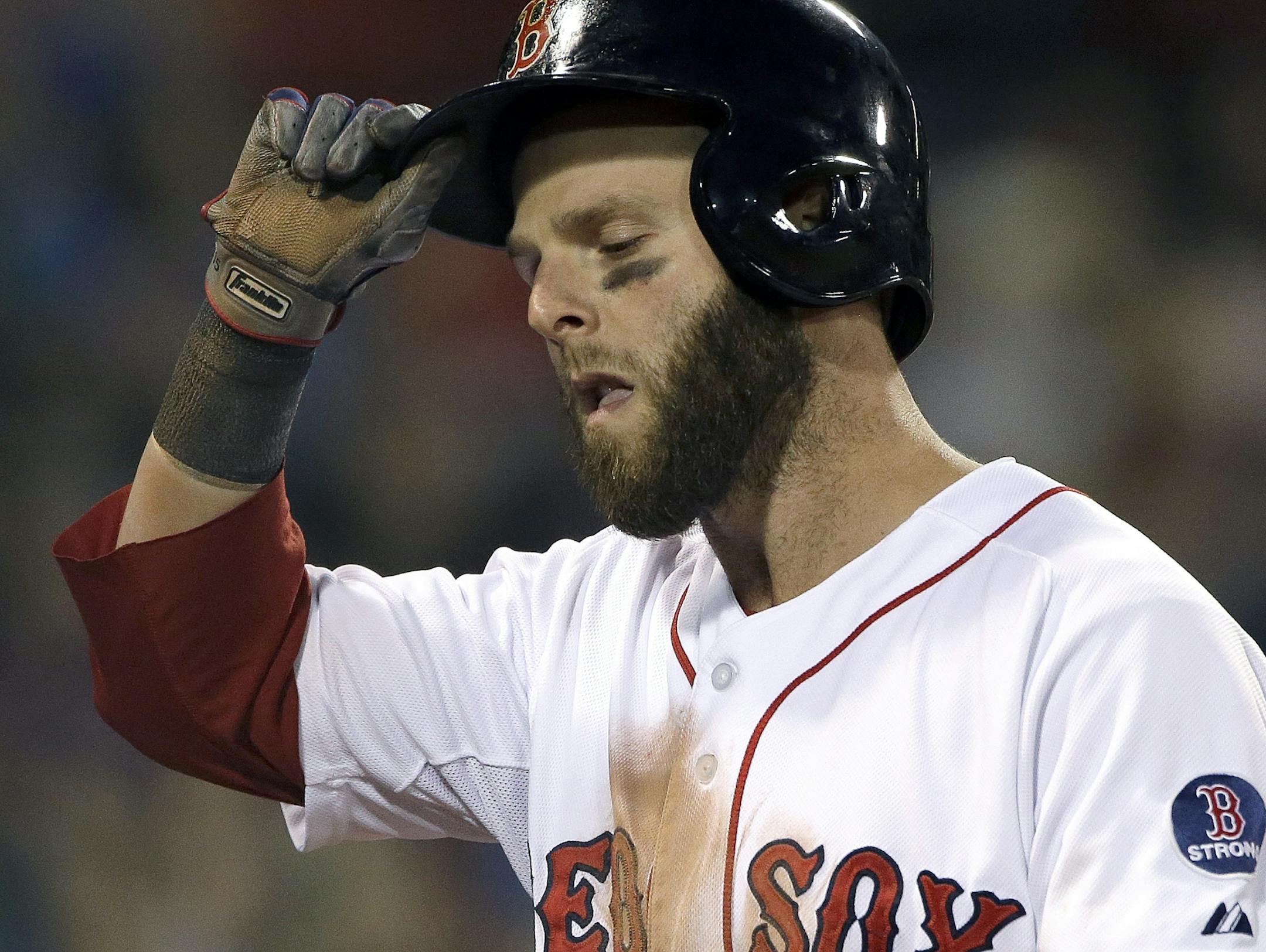 Boston Red Sox's Dustin Pedroia reacts after grounding out against the Minnesota Twins during the fourth inning of a baseball game at Fenway Park in Boston, Wednesday, May 8, 2013.