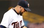 Minnesota Twins pitcher Glen Perkins reacted after giving up a home run to Jung Ho Kang in the ninth inning. Pittsburg beat Minnesota by a final score