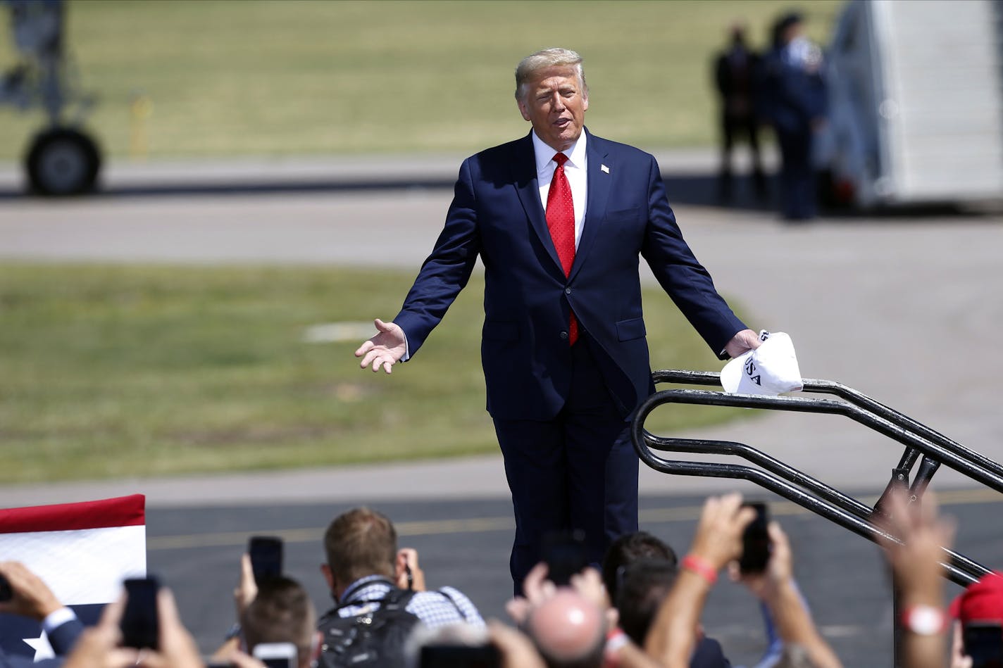 President Donald Trump speaks at a campaign stop at North Star Aviation in Mankato, Minn., Monday, Aug. 17, 2020. (AP Photo/Jim Mone)