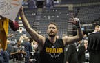 FILE - In this Feb. 23, 2018, file photo, Cleveland Cavaliers forward Kevin Love greets fans before an NBA basketball game against the Memphis Grizzli