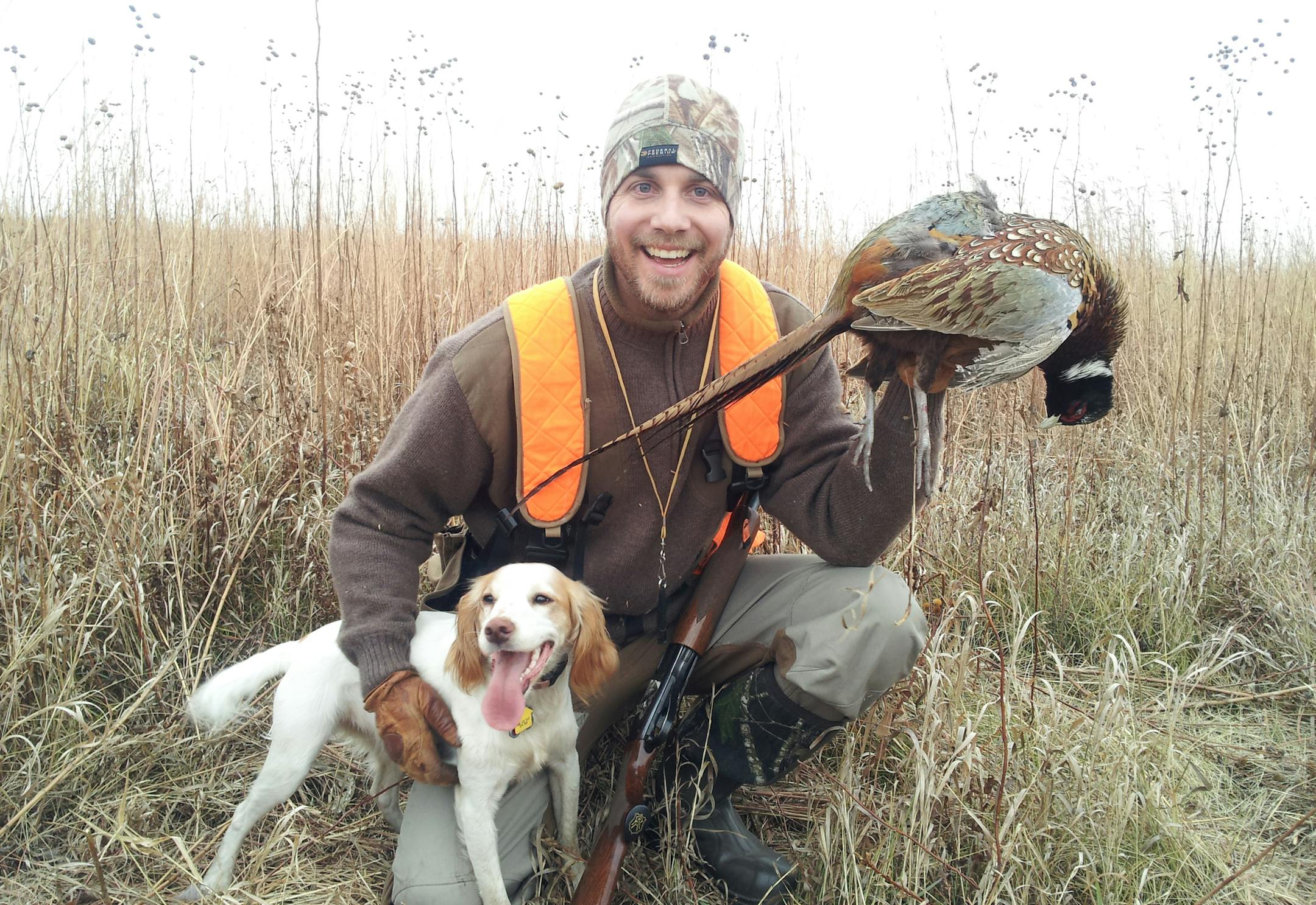 Anthony Hauck of Roseville with his English cocker spaniel, Sprig, during a successful pheasant hunt. Photo courtesy Anthony Hauck. ORG XMIT: MIN1310071631102662