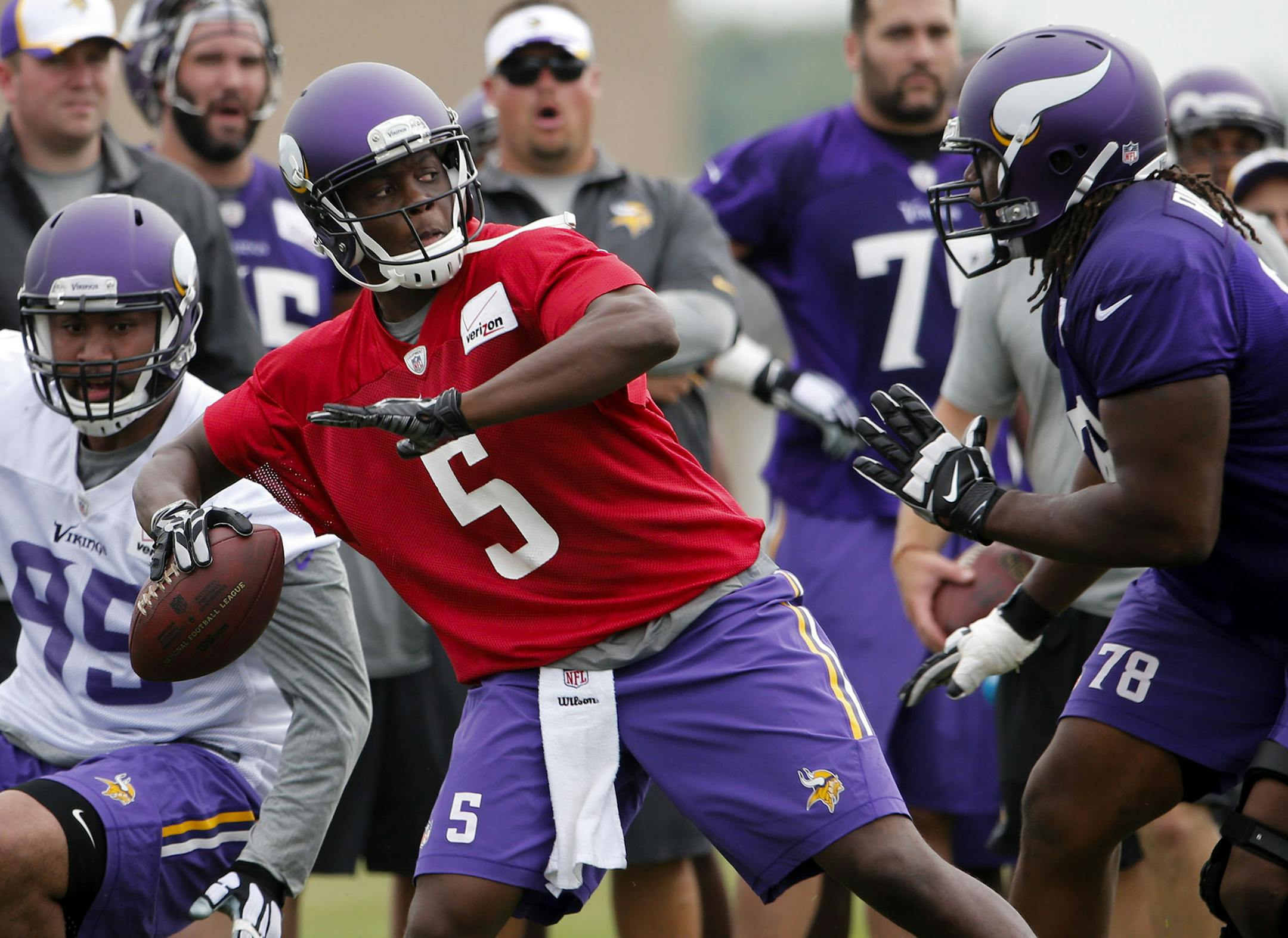 Minnesota Vikings rookie quarterback Teddy Bridgewater (5) airs out a pass during training camp Friday, July 24, 2014, at Mankato State University in Mankato, MN.] (DAVID JOLES/STARTRIBUNE) djoles@startribune Minnesota Vikings training camp Friday, July 24, 2014, in Mankato, MN. ORG XMIT: MIN1407251908191652