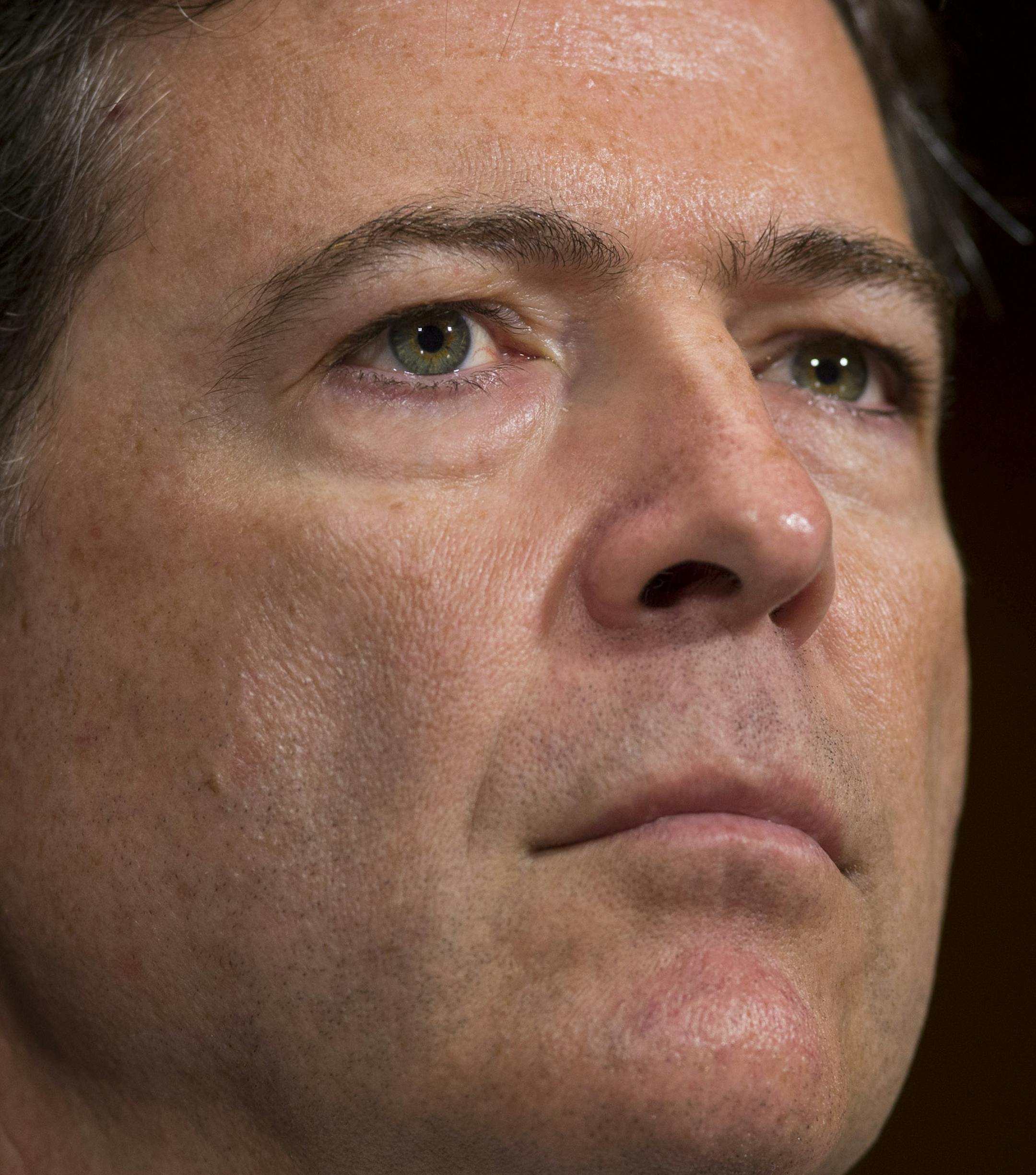 FILE - In this July 9. 2013 file photo, FBI director nominee James Comey testifies during a Senate Judiciary Committee in Washington. The Senate Judiciary Committee has unanimously approved the nomination of James Comey to be director of the FBI, clearing the way for a full Senate vote. (AP Photo/Evan Vucci)