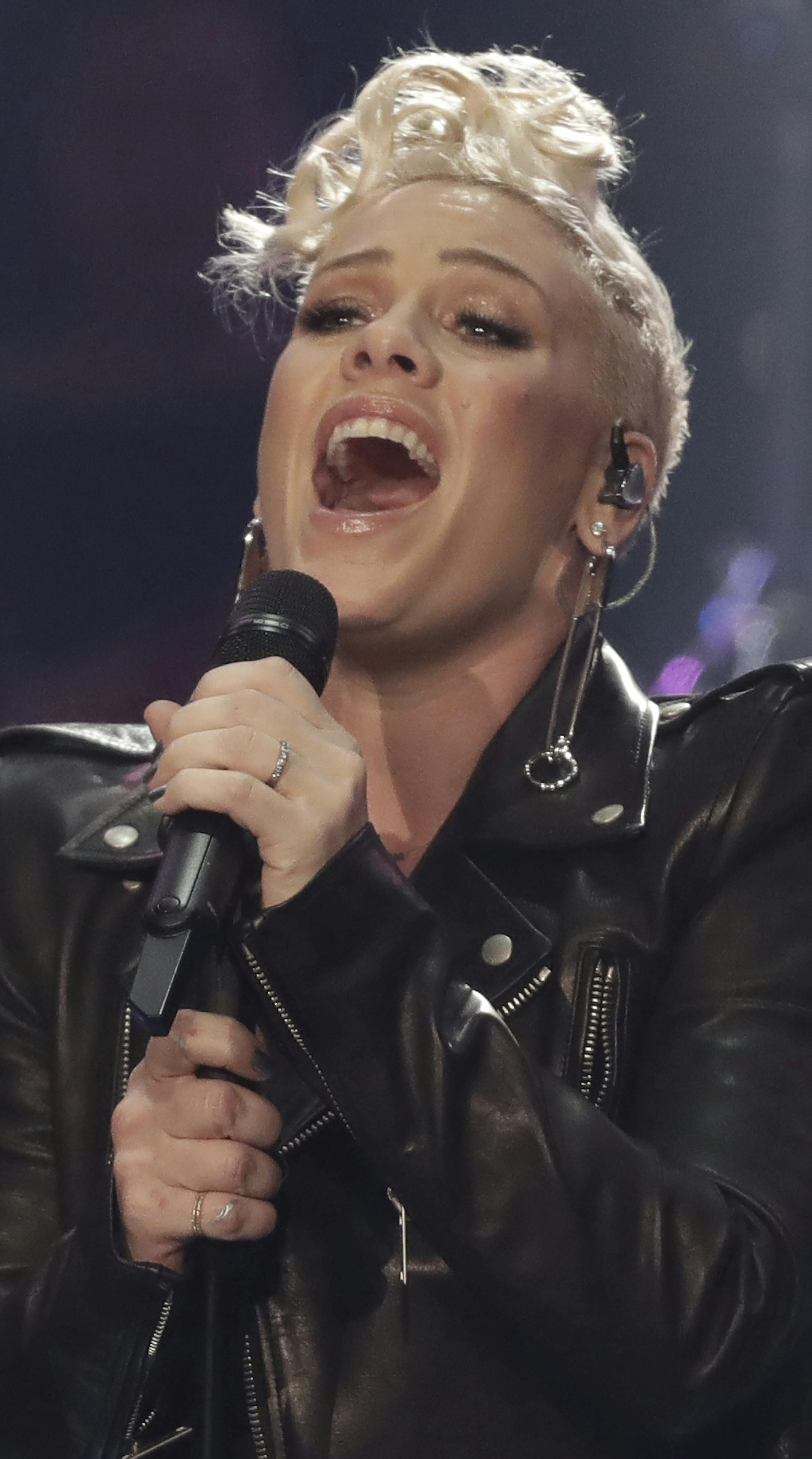 US singer Pink performs during the TV casting show 'The Voice of Germany' in Berlin, Germany, Sunday, Dec. 10, 2017. (Joerg Carstensen/dpa via AP)