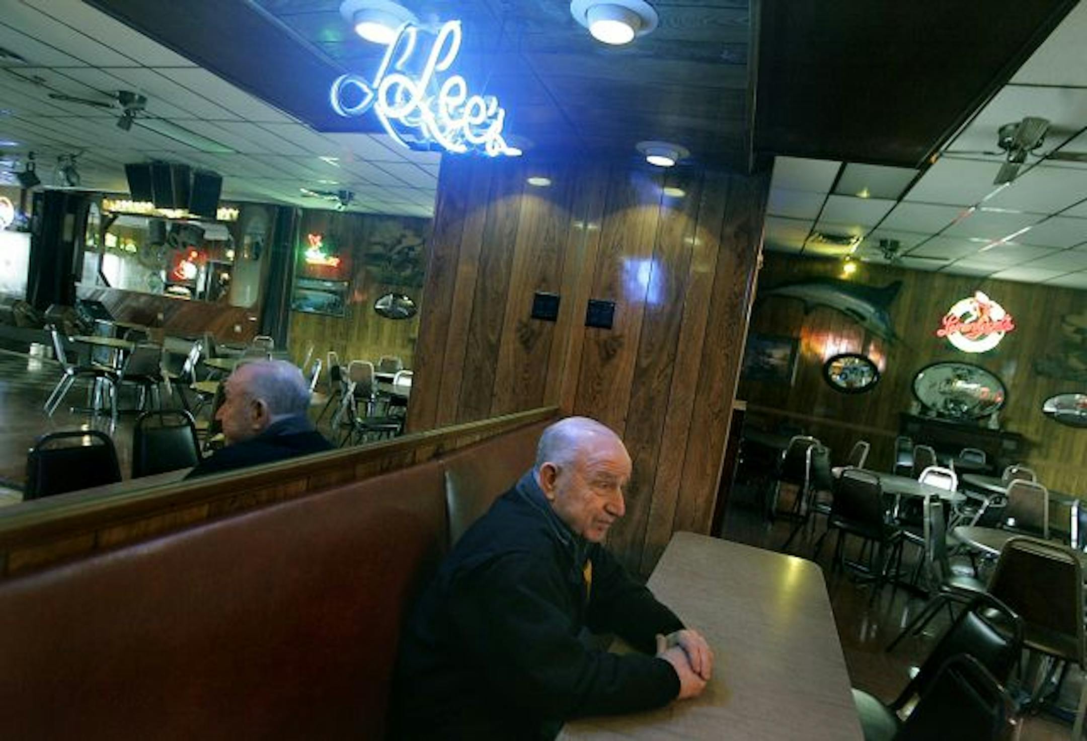 ELIZABETH FLORES � eflores@startribune.com February 13, 2009 - Minneapolis, MN - For Lee's Liquor Lounge owner, Lou Sirion, it looked like like the new twins stadium was going to be a blessing. Instead, it might be a mess. It looks like the twins are going to come and take his parking lot. Lee's is named after Sirion's wife.