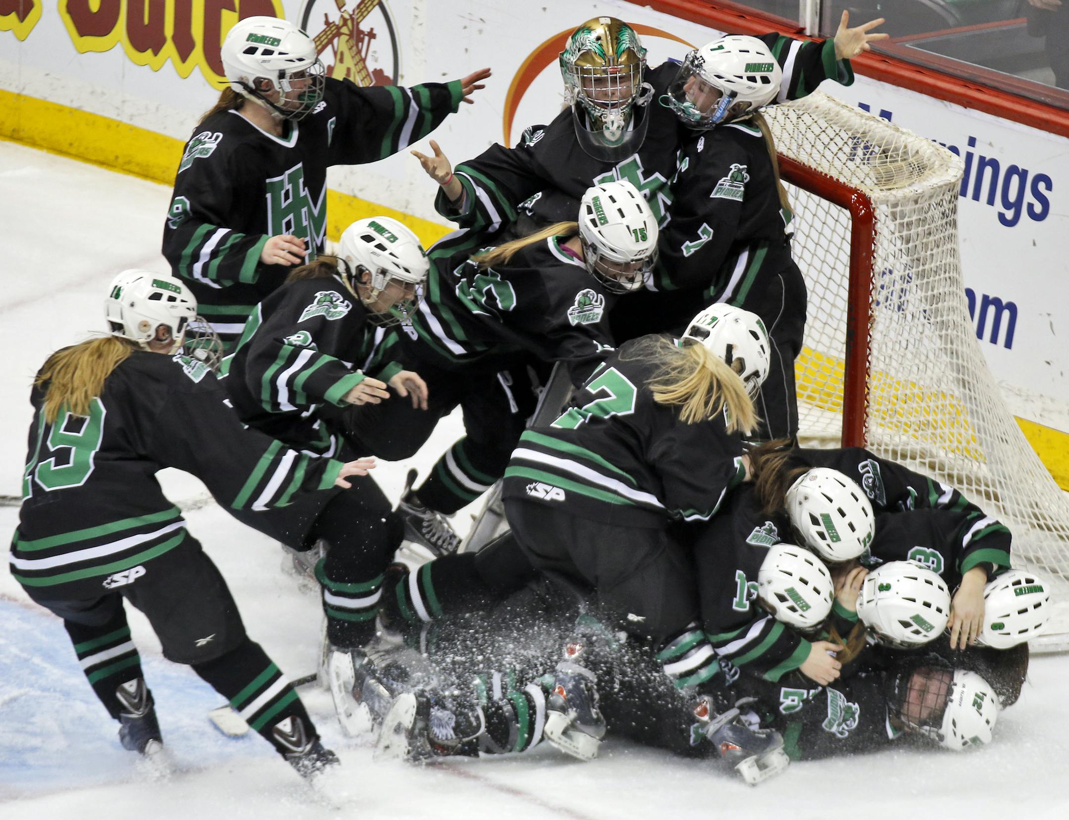 Girls 2A State Hockey Championship Game - Hill-Murray Pioneers vs. Benilde St. Margaret's Red Knights. Hill-Murray won 5-3. Hill-Murray players celebrated their victory at the end of the game. (MARLIN LEVISON/STARTRIBUNE(mlevison@startribune.com)