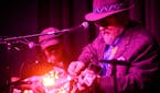 Dakota Dave Hull, right, performed with Kari Larson during a concert Thursday night at Hook & Ladder. The venue was hosting a show for KFAI Radio's Da