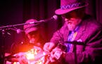 Dakota Dave Hull, right, performed with Kari Larson during a concert Thursday night at Hook & Ladder. The venue was hosting a show for KFAI Radio's Da