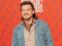 FILE - In this June 5, 2019, file photo, Morgan Wallen arrives at the CMT Music Awards on at the Bridgestone Arena in Nashville.